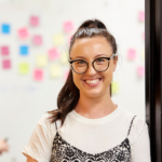 Staff member smiling at camera